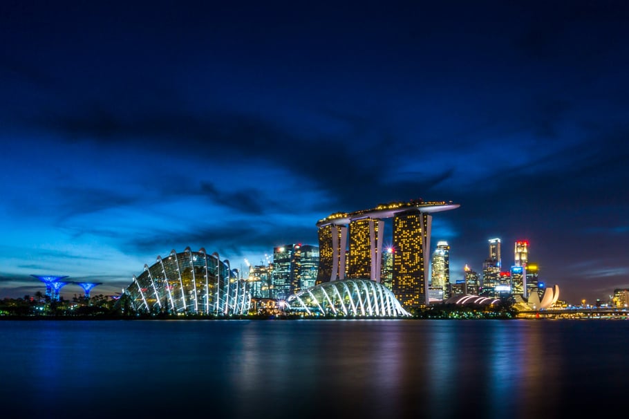 Photo by Mike Enerio on Unsplash - photo of Singapore at dusk